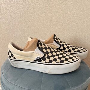 Vans Black and White Checkerboard Slip-Ons